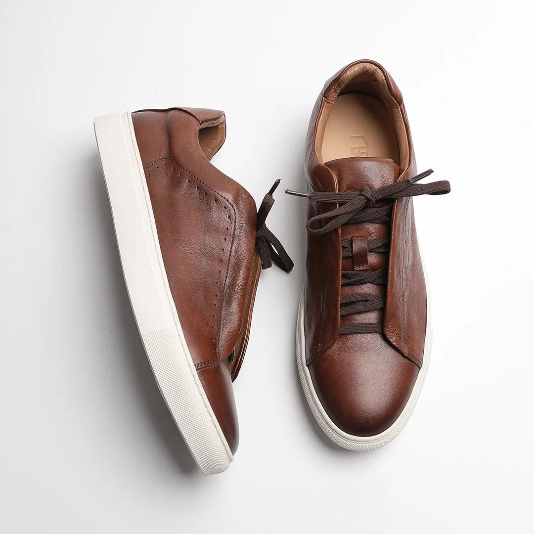 tenis de couro masculino, tenis couro masculino, tenis masculino de couro, tenis masculino, tênis couro masculino, tênis masculino de couro legítimo, tênis casual masculino couro, tênis de couro marrom masculino, tênis masculino couro confortável, tênis masculino elegante, tênis social masculino casual, tênis de couro premium, tênis couro legítimo masculino, tênis de couro com solado branco, tênis masculino couro estilo italiano, tênis marrom masculino, tênis masculino couro urbano, tênis masculino couro